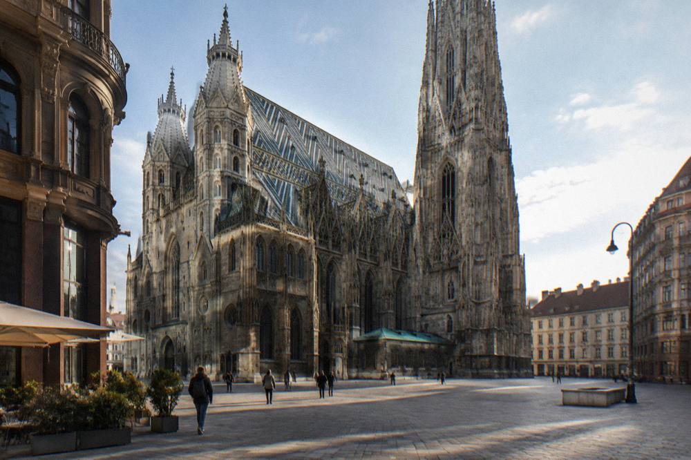 The cathedral's west front and Heidentürme seen from the corner of Stephansplatz with the paving in side light